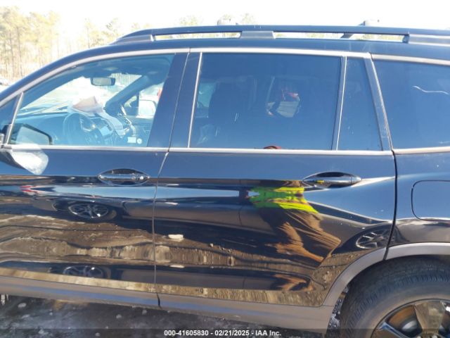 5FNYF8H01KB002512 Honda Passport Elite