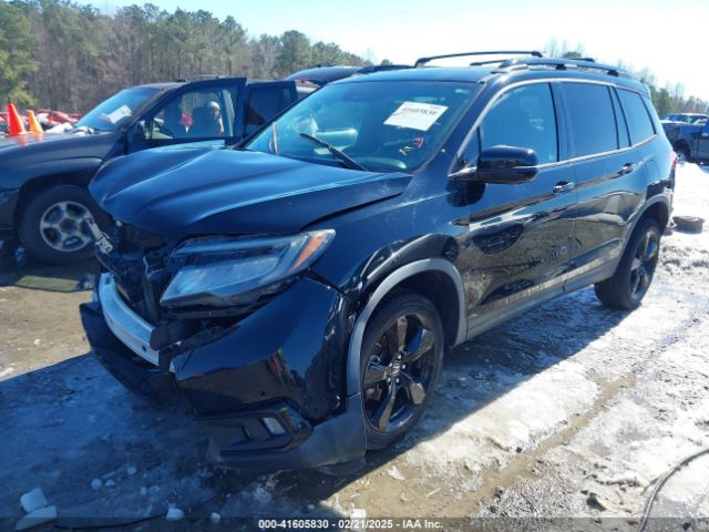 5FNYF8H01KB002512 Honda Passport Elite