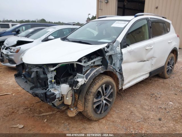 2017 TOYOTA RAV4 JTMZFREV9HJ142576 Photo 1