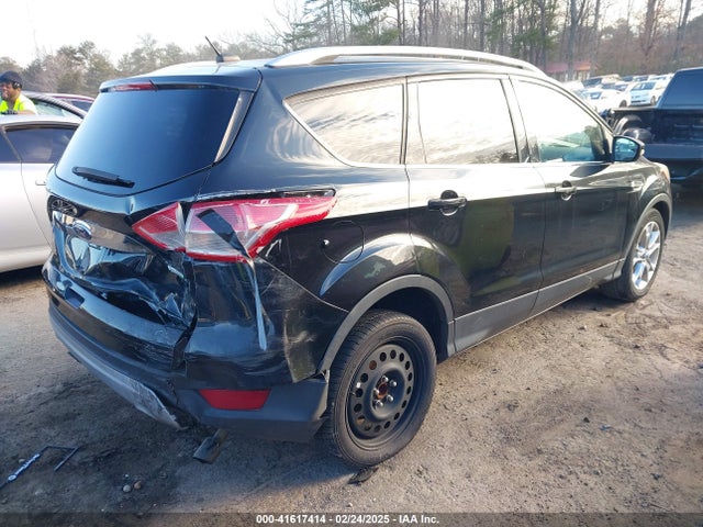 1FMCU0JX1EUA43013 Ford Escape Titanium