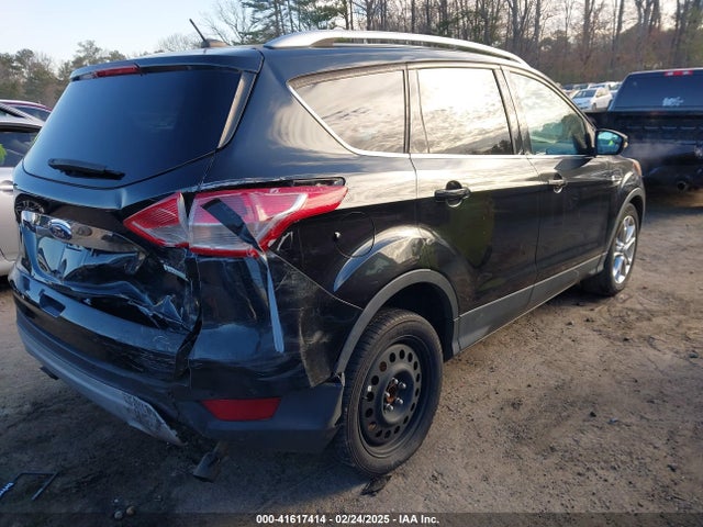 1FMCU0JX1EUA43013 Ford Escape Titanium