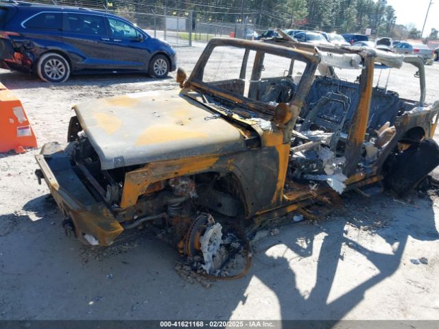 1C4BJWDGXEL149702 Jeep Wrangler Unlimited Sport