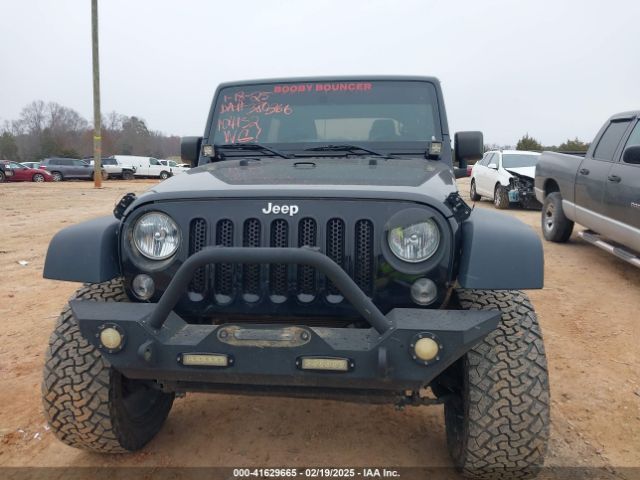 1C4BJWDG8GL104132 Jeep Wrangler Unlimited Sport