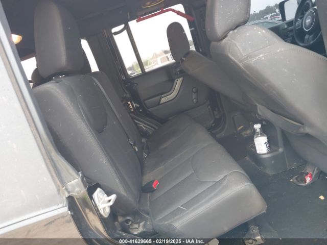 1C4BJWDG8GL104132 Jeep Wrangler Unlimited Sport