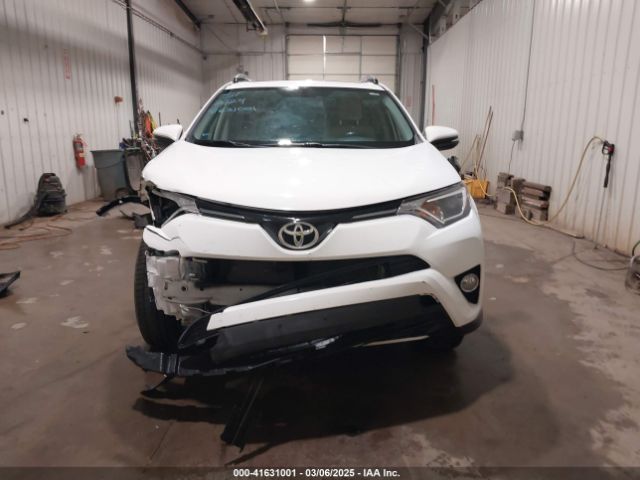 JTMRFREVXGJ099560 Toyota Rav4 Xle
