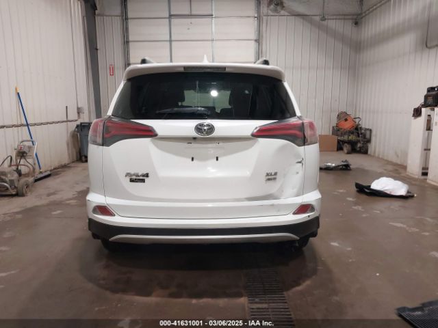 JTMRFREVXGJ099560 Toyota Rav4 Xle