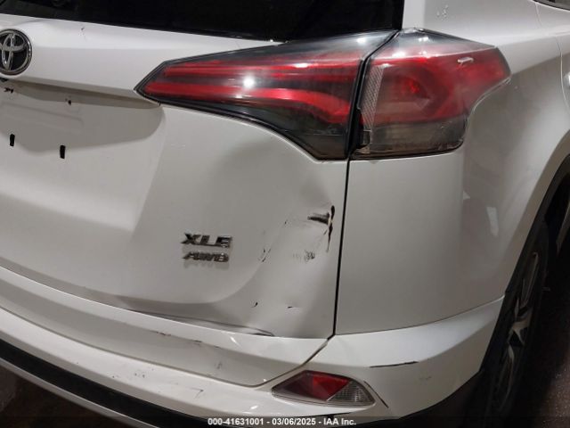 JTMRFREVXGJ099560 Toyota Rav4 Xle