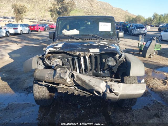 1C4BJWDG0FL565520 Jeep Wrangler Unlimited Sport