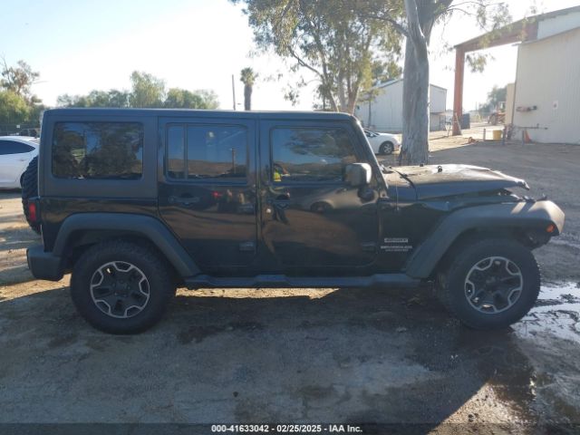 1C4BJWDG0FL565520 Jeep Wrangler Unlimited Sport
