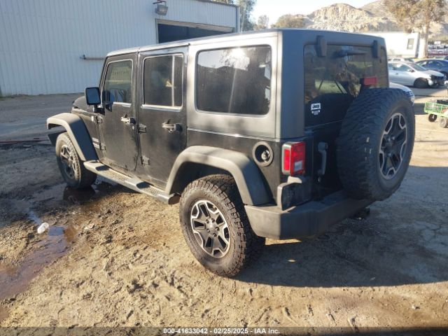 1C4BJWDG0FL565520 Jeep Wrangler Unlimited Sport