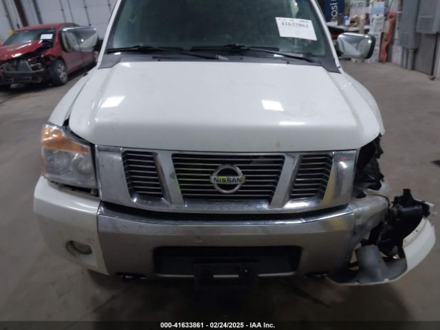 1N6AA0EC1EN504617 Nissan Titan Sl