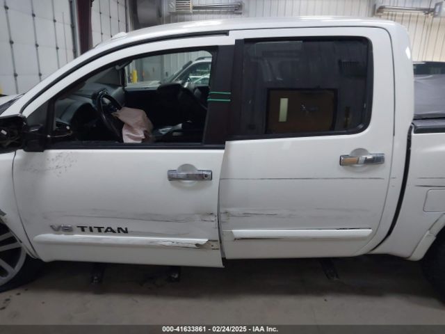 1N6AA0EC1EN504617 Nissan Titan Sl