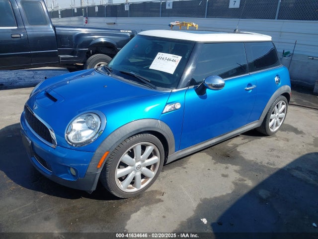 2009 MINI COOPER S WMWMF73579TT99627 Photo 1