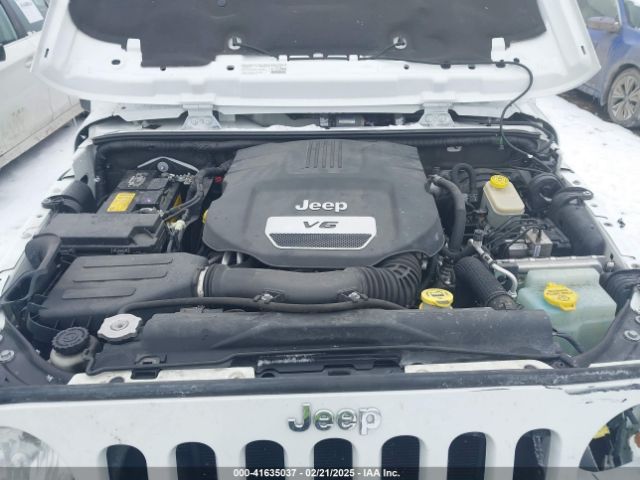 1C4BJWEG4EL118797 Jeep Wrangler Unlimited Sahara