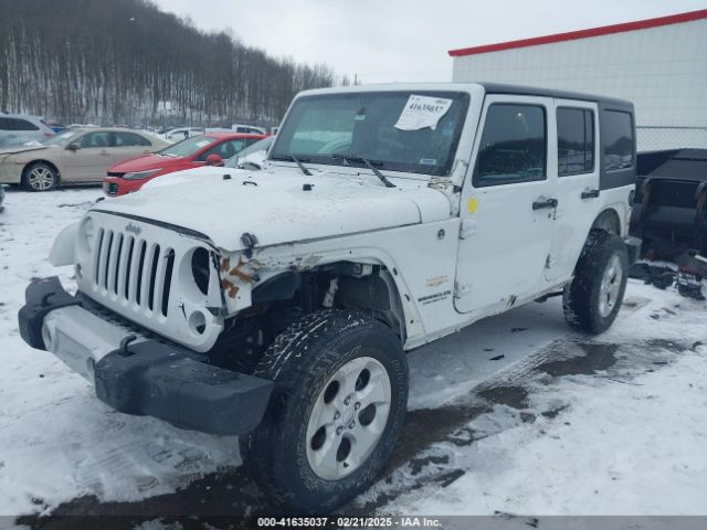 1C4BJWEG4EL118797 Jeep Wrangler Unlimited Sahara