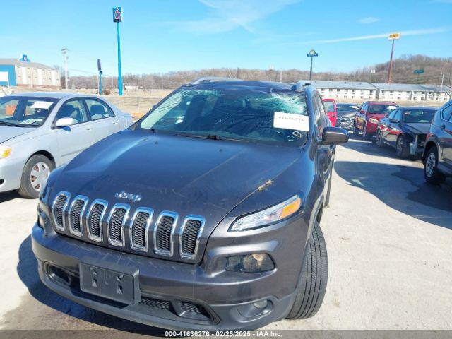 1C4PJMCB9EW308241 Jeep Cherokee Latitude