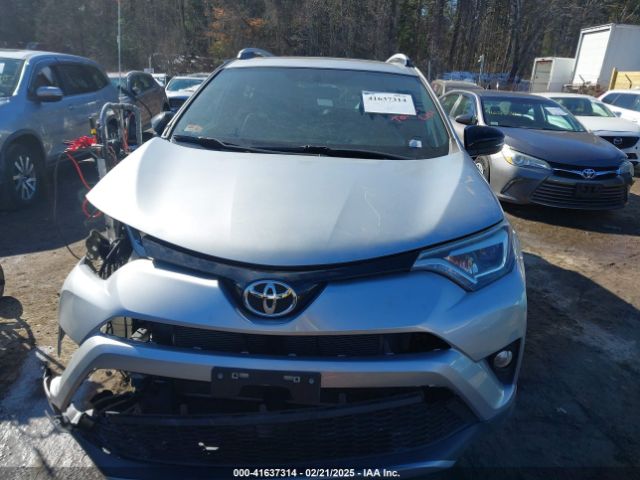 2T3JFREVXGW490061 Toyota RAV4 SE
