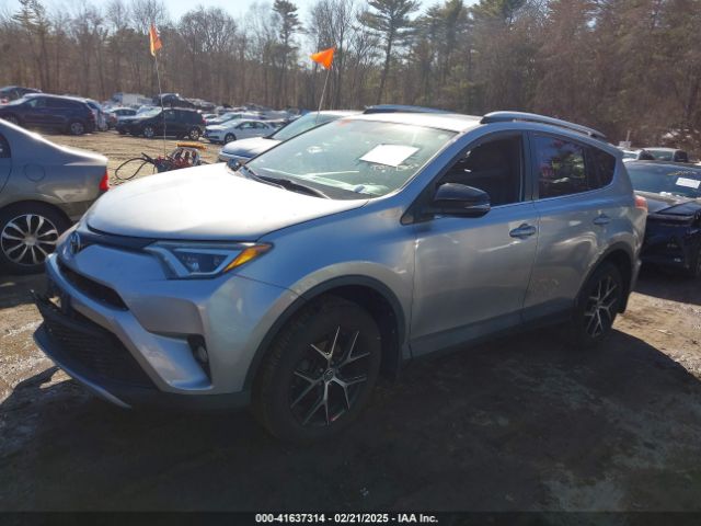 2T3JFREVXGW490061 Toyota RAV4 SE