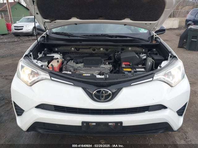 JTMBFREV6JJ235868 Toyota RAV4 LE
