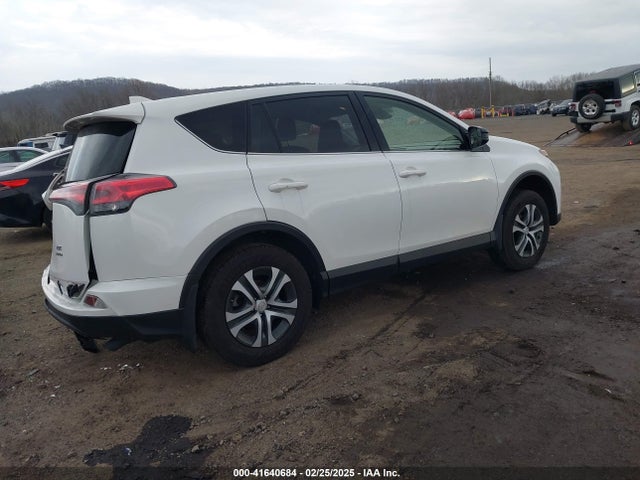 JTMBFREV6JJ235868 Toyota RAV4 LE