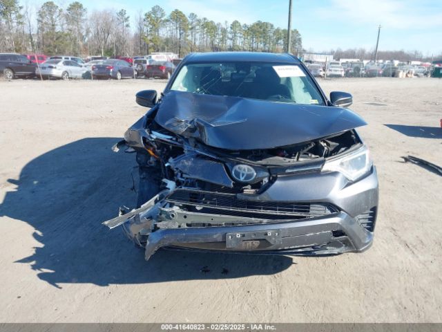 2T3BFREV8JW854358 Toyota RAV4 LE