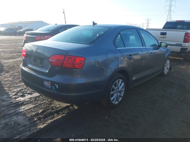 3VWD17AJ7EM321971 Volkswagen Jetta 1.8t Se
