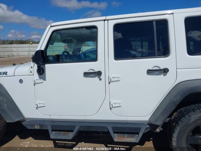 1C4BJWDG8GL102784 Jeep Wrangler Unlimited Black Bear