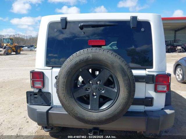 1C4BJWDG8GL102784 Jeep Wrangler Unlimited Black Bear