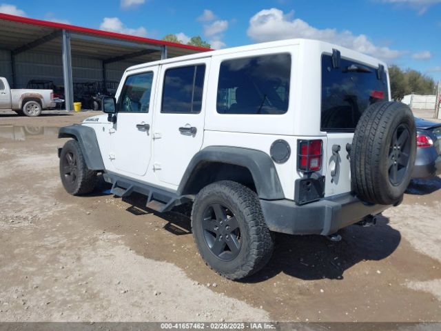 1C4BJWDG8GL102784 Jeep Wrangler Unlimited Black Bear