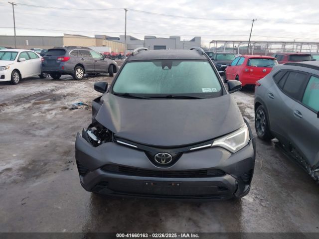 JTMBFREV8JJ221731 Toyota RAV4 LE