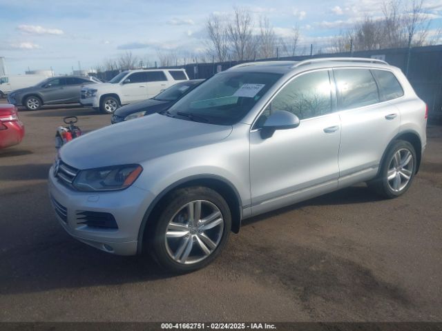 2012 VOLKSWAGEN TOUAREG WVGEK9BP8CD008211 Photo 1