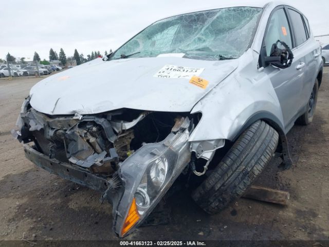 2T3ZFREV2FW155524 Toyota RAV4 LE