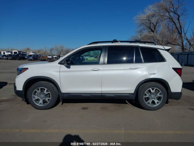5FNYF8H60PB015912 Honda Passport Awd Trailsport