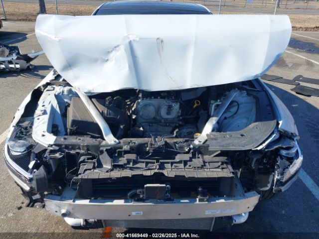 KMTG34TA7NU098169 Genesis G70 2.0t Awd
