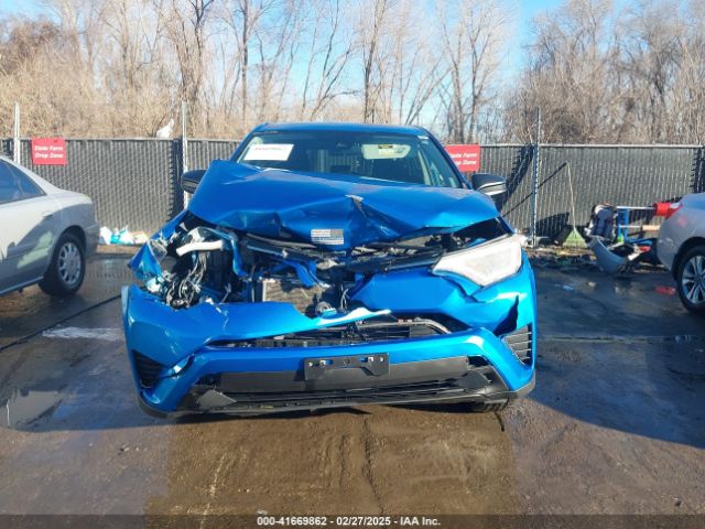2T3ZFREV9JW476839 Toyota RAV4 LE