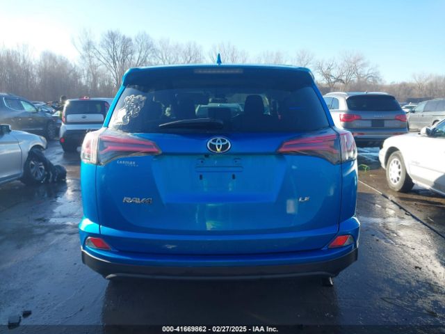 2T3ZFREV9JW476839 Toyota RAV4 LE