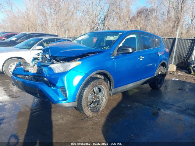 2T3ZFREV9JW476839 Toyota RAV4 LE
