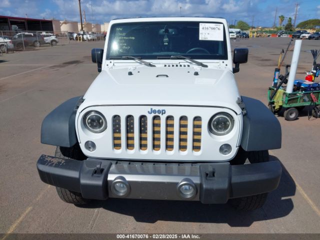 1C4BJWDGXGL238558 Jeep Wrangler Unlimited Sport