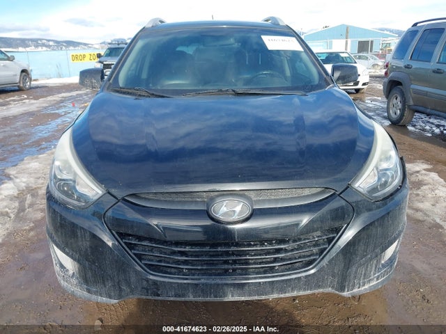 KM8JUCAG9EU860528 Hyundai TUCSON SE