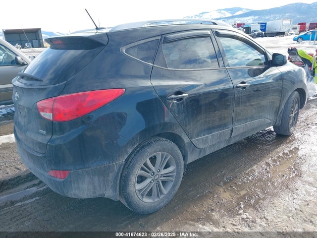 KM8JUCAG9EU860528 Hyundai TUCSON SE
