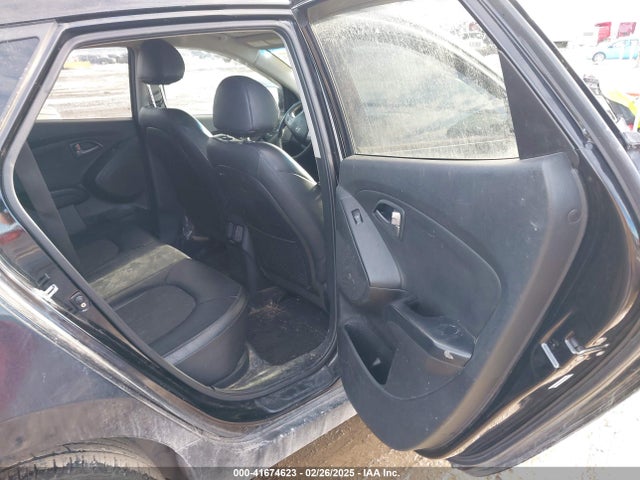 KM8JUCAG9EU860528 Hyundai TUCSON SE