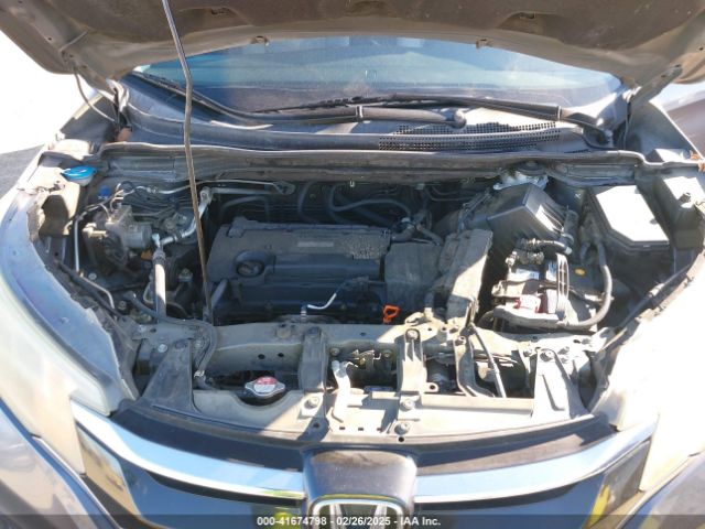 2HKRM4H36GH607180 Honda CR-V LX