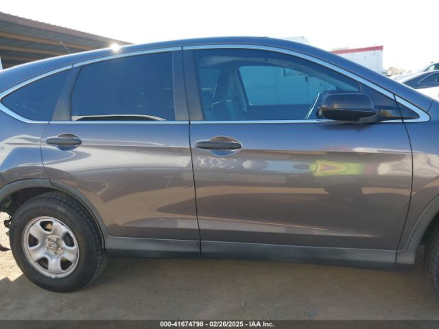 2HKRM4H36GH607180 Honda CR-V LX