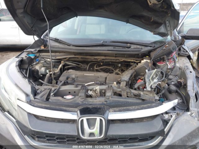 2HKRM4H42GH712016 Honda CR-V SE