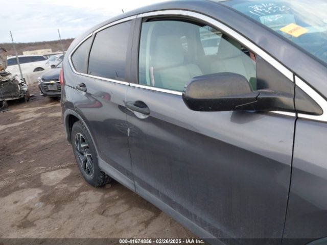 2HKRM4H42GH712016 Honda CR-V SE