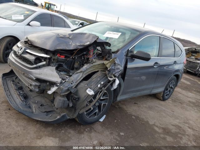 2HKRM4H42GH712016 Honda CR-V SE