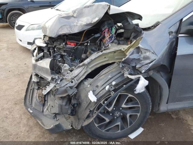 2HKRM4H42GH712016 Honda CR-V SE