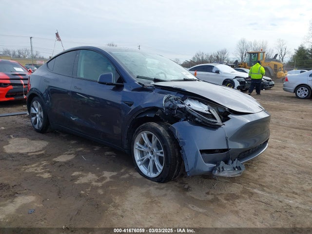 2023 TESLA MODEL Y 7SAYGDEE1PF755666 Photo 0