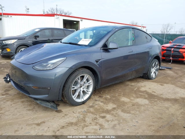 2023 TESLA MODEL Y 7SAYGDEE1PF755666 Photo 1