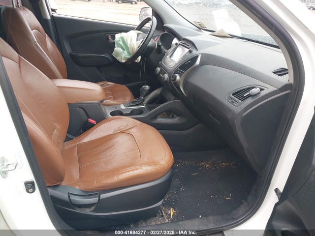 KM8JUCAG1EU945945 Hyundai Tucson Limited